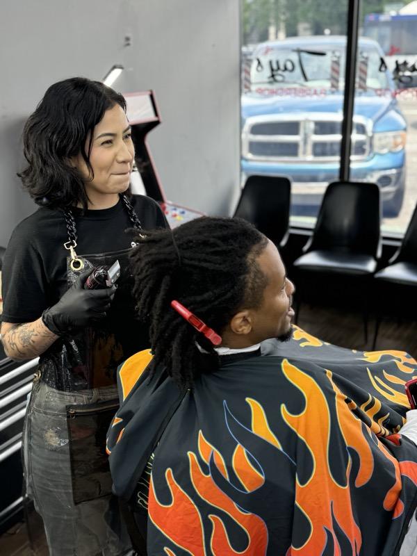 Barber and client at Tay's Barbershop Sacramento